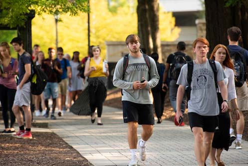 Students walking near the Burruss Building
