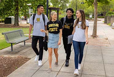 Photos of students walking on campus